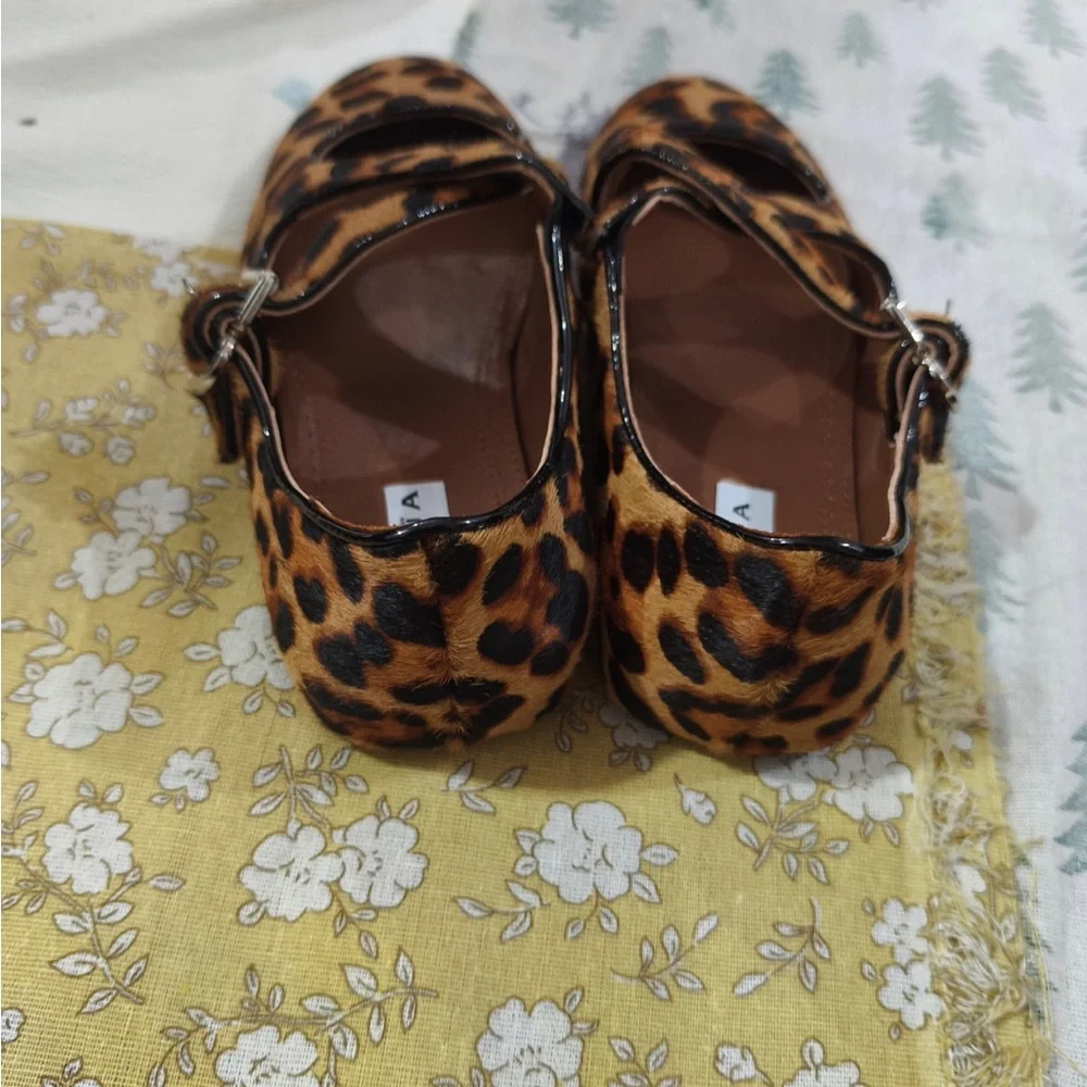 Alaia Leopard-Print Mary Jane Flats in Brown and Black